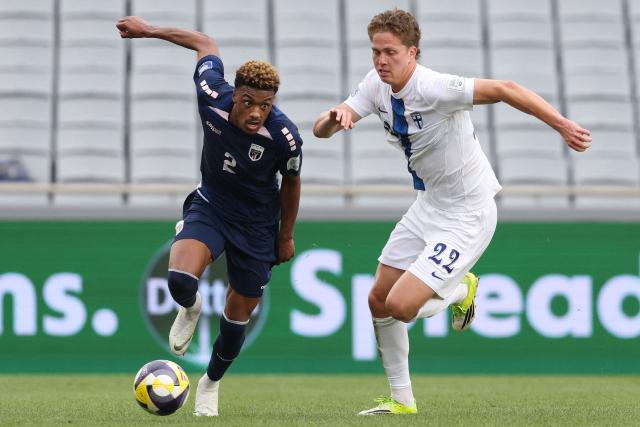 Cape Verde's Wagner Pina (L) and Finland's Onni Valakari compete for the ball during the international friendly football match between Cape Verde and Finland at Eden Park in Auckland on March 30, 2026. (Photo by Michael Bradley / AFP)