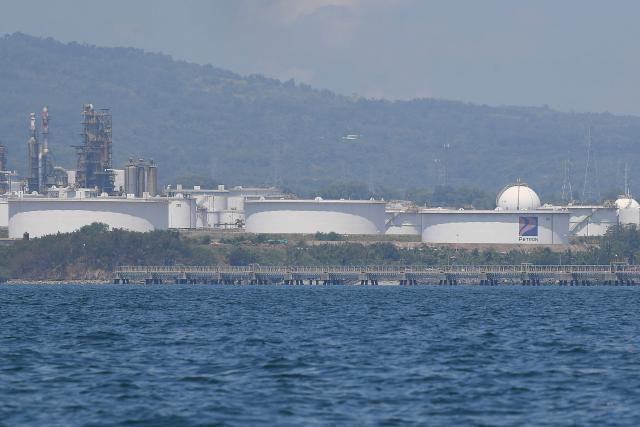 This photo taken on March 26, 2026 shows a general view of the Petron oil refinery plant in Limay town, Bataan province. The Philippines' sole oil refinery has secured nearly 2.5 million barrels of Russian crude out of "extreme necessity", a stock exchange filing revealed on March 30, as the country seeks to replenish fast-dwindling fuel reserves. (Photo by Ted ALJIBE / AFP)