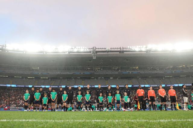 New Zealand's team line up for the national anthems during the international friendly football match between New Zealand and Chile at Eden Park in Auckland on March 30, 2026. (Photo by Michael Bradley / AFP)