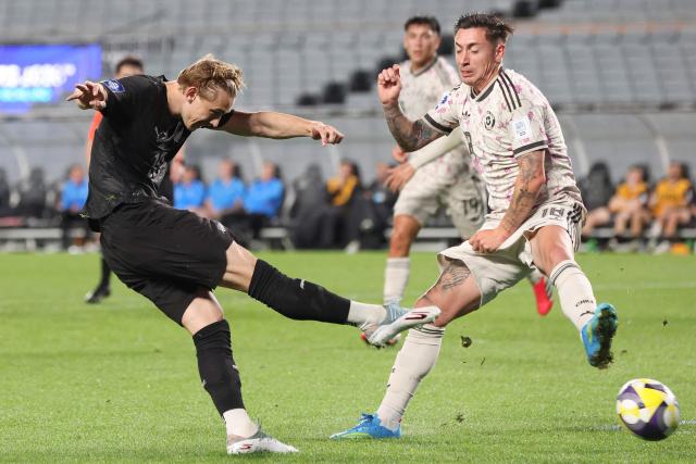 New Zealand's Ben Waine scores a goal during the international friendly football match between New Zealand and Chile at Eden Park in Auckland on March 30, 2026. (Photo by Michael Bradley / AFP)