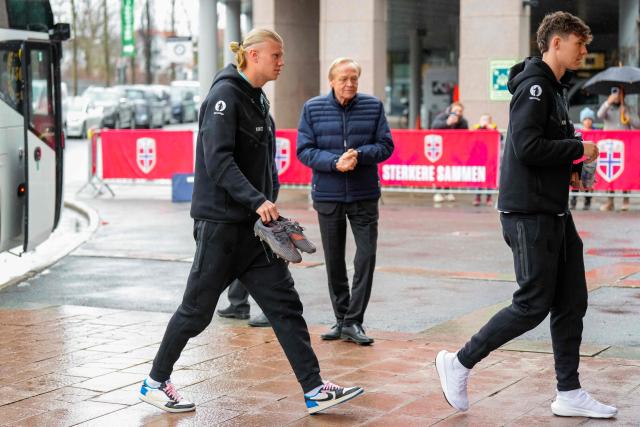 Norway's forward #09 Erling Braut Haaland and Norway's forward #11 Jorgen Strand Larsen
arrive before a press conference and training with the Norwegian men's national football team at Ullevaal Stadium on the eve of the International Friendly Football match Norway vs Switzerland on March 30, 2026. (Photo by Fredrik Varfjell / NTB / AFP) / Norway OUT