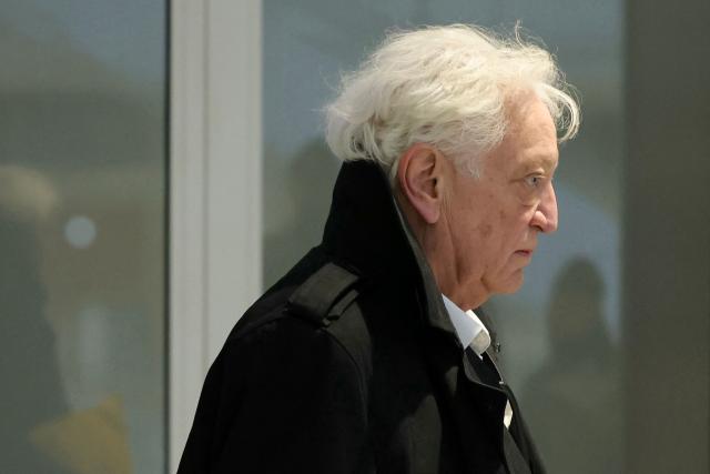 Radio and TV host Laurent Boyer arrives for his trial on charges of domestic violence and harassment at the Tribunal Judiciaire courthouse in Paris on March 30, 2026. Boyer faces accusations filed by a former partner of habitual domestic violence, harassment, and non-consensual recording of intimate images. (Photo by Thomas SAMSON / AFP)