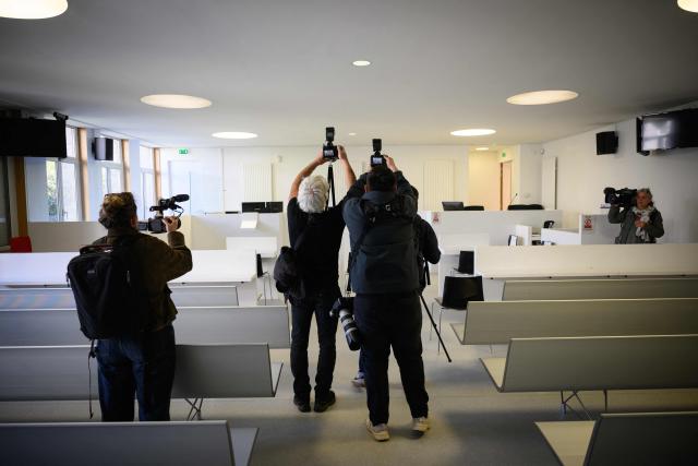 Journalists film the courtroom ahead of the opening hearing of the trial of French skipper Kevin Escoffier on charges of sexual assault in Lorient, western France, on March 30, 2026. (Photo by Loic VENANCE / AFP)