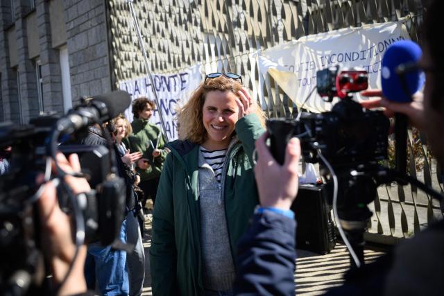 French skipper Clarisse Cremer talks to journalists in front of the courthouse where the trial of French skipper Kevin Escoffier on charges of sexual assault opens in Lorient, western France, on March 30, 2026. (Photo by Loic VENANCE / AFP)