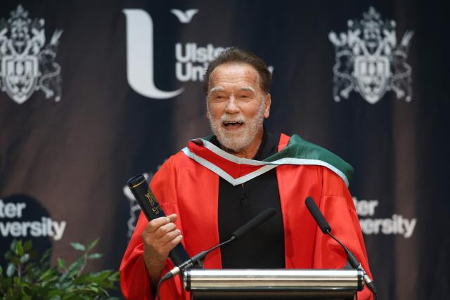 Hollywood actor and former California state governor, Arnold Schwarzenegger, attends a ceremony to receive an honorary doctorate from Ulster University in Belfast, Northern Ireland, on March 30, 2026. (Photo by Paul Faith / AFP)