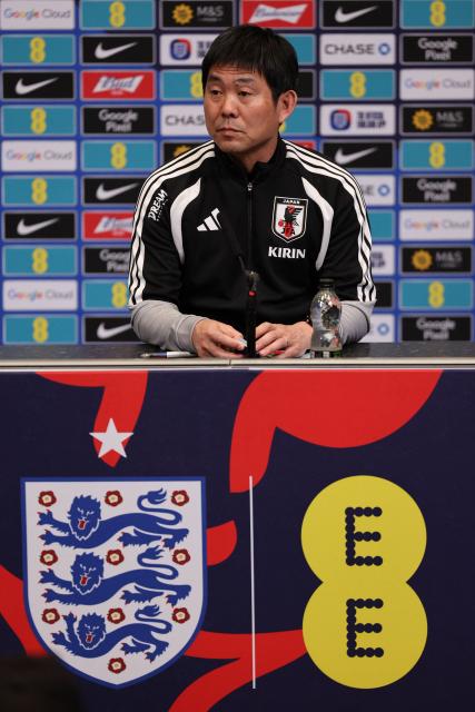 Japan's Head Coach Hajime Moriyasu attends a press conference at Wembley Stadium, in London, on March 30, 2026, on the eve of their international friendly football match against England. (Photo by Adrian Dennis / AFP)