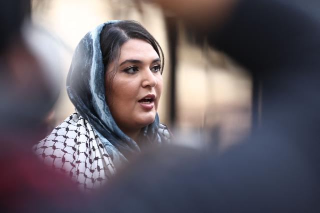 Palestinian-American activist Nerdeen Kiswani speaks during a press conference in New York on March 30, 2026, after US authorities said they had disrupted an alleged plot targeting her. Kiswani, a US-based Palestinian-American activist, said March 27 that the FBI had disrupted an imminent plot to assassinate her, as authorities charged a 26-year-old man with possessing Molotov cocktails he meant to use against her home. Kiswani leads Within Our Lifetime, a Palestinian advocacy group active in New York City, and has been a key figure in organizing protests particularly focused on the Gaza war. (Photo by CHARLY TRIBALLEAU / AFP)