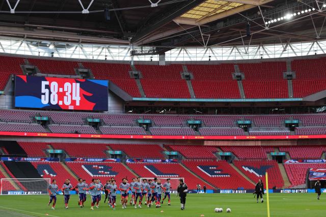Japan's players take part in a team training session at Wembley Stadium, in London, on March 30, 2026, on the eve of their international friendly football match against England. (Photo by Adrian Dennis / AFP)