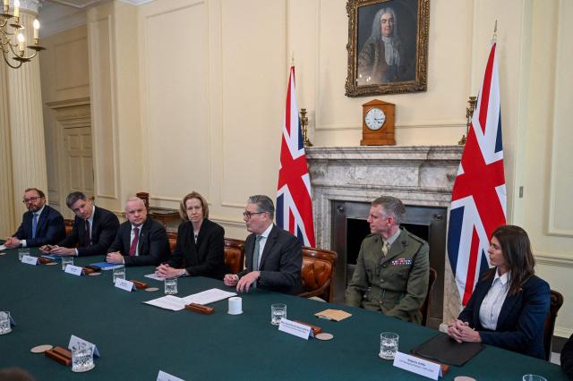 (L-R) HFW Global Head of Shipping Paul Dean, HSBC UK CEO David Lindberg, Equinor CEO Anders Opedal, BP CEO appointee Meg O'Neill, Britain's Prime Minister Keir Starmer, Major General Richard Cantrill, Commander Operations (Royal Navy), and CMA CGM Managing Director UK Natasha Griffin attend a meeting to discuss the US-Israeli conflict with Iran and the impact on the Strait of Hormuz, inside 10 Downing Street in London on March 30, 2026. British Prime Minister Keir Starmer convenes with major players in the economic world, including those from the energy sector, and government officials to discuss the consequences of the war in Iran. (Photo by Jaimi Joy / POOL / AFP)