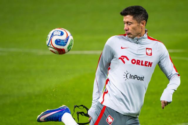 Poland's forward #09 Robert Lewandowski plays the ball during a training session of Poland's national football team on the eve of the play-off FIFA World Cup 2026 qualification final football match Sweden vs Poland, in Stockholm, Sweden on March 30, 2026. (Photo by Jonas EKSTROMER / TT News Agency / AFP) / Sweden OUT