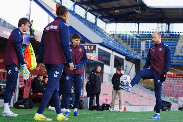 Denmark's midfielder #10 Christian Eriksen (R), Denmark's goalkeeper Frederik Ronnow, and Denmark's midfielder Jesper Lindstrom and team mates attend a training session in Copenhagen on March 30, 2026, ahead of the team's play-off FIFA World Cup 2026 qualification final football match against Czech Republic to be played in Prague on March 31. (Photo by Liselotte Sabroe / Ritzau Scanpix / AFP) / Denmark OUT
