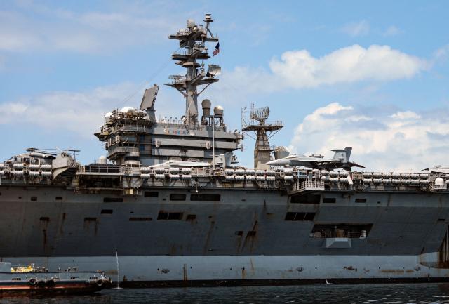 The US Navy aircraft carrier USS Nimitz sails on Panama Bay, in Panama City on March 30, 2026. The ship reached the country alongside the guided-missile destroyer USS Gridley (DDG 101), as part of the multinational maritime cooperation exercises “Mares del Sur 2026.” (Photo by HUGE PERALTA / AFP)