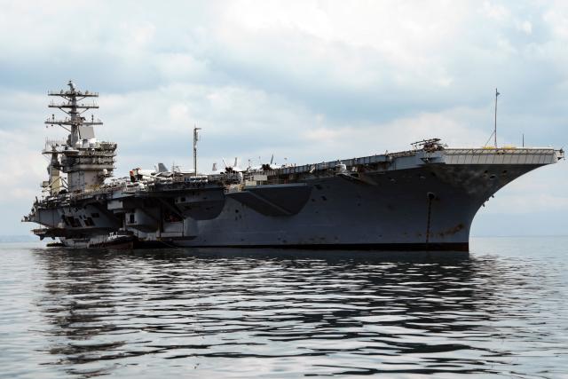 The US Navy aircraft carrier USS Nimitz sails on Panama Bay, in Panama City on March 30, 2026. The ship reached the country alongside the guided-missile destroyer USS Gridley (DDG 101), as part of the multinational maritime cooperation exercises “Mares del Sur 2026.” (Photo by HUGE PERALTA / AFP)