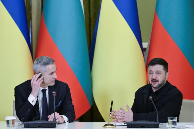 Ukrainian President Volodymyr Zelensky (R) and Bulgarian Prime Minister Andrey Gyurov attend a joint press conference after meeting in Kyiv on March 30, 2026, amid the Russian invasion of Ukraine. (Photo by Genya SAVILOV / AFP)