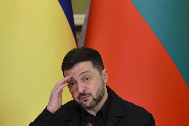 Ukrainian President Volodymyr Zelensky attends a joint press conference with Bulgarian Prime Minister following their meeting in Kyiv on March 30, 2026, amid the Russian invasion of Ukraine. (Photo by Genya SAVILOV / AFP)