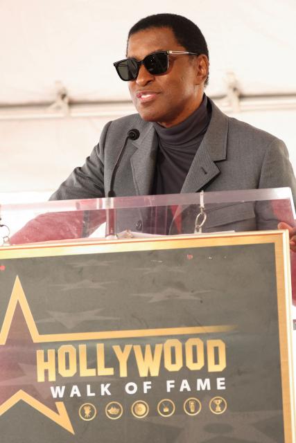 US singer Babyface speaks during US singer and actress Brandy's Walk of Fame star ceremony in Hollywood on March 30, 2026. (Photo by Patrick T. Fallon / AFP)