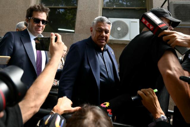 (FILES) Argentine Football Association (AFA) president Claudio "Chiqui" Tapia leaves the National Court for Economic Crimes in Buenos Aires on March 12, 2026. An Argentine judge has formally charged the Argentine Football Association (AFA), its president Claudio ‘Chiqui’ Tapia and other officials with tax evasion, according to a ruling released on March 30, 2026. (Photo by Luis ROBAYO / AFP)