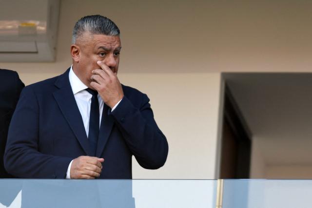 (FILES) President of the Argentine Football Association, Claudio "Chiqui" Tapia, gestures during the Argentina 2023 U-20 World Cup Group A football match between New Zealand and Argentina at the Estadio San Juan del Bicentenario stadium in San Juan, Argentina on May 26, 2023. An Argentine judge has formally charged the Argentine Football Association (AFA), its president Claudio ‘Chiqui’ Tapia and other officials with tax evasion, according to a ruling released on March 30, 2026. (Photo by Andres Larrovere / AFP)