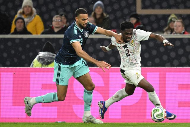 (From L) Germany's defender #23 Josha Vagnoman and Ghana's defender #02 Derrick Koehn vie for the ball during the international friendly football match between Germany and Ghana in Stuttgart, southwestern Germany on March 30, 2026. (Photo by THOMAS KIENZLE / AFP)