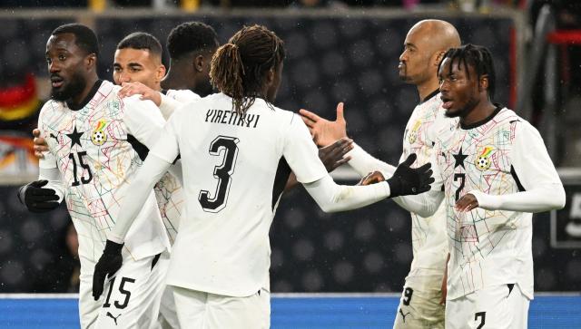 Ghana's players celebrate after Ghana's forward #07 Fatawu Issahaku (R) scored his team's first goal during the international friendly football match between Germany and Ghana in Stuttgart, southwestern Germany on March 30, 2026. (Photo by THOMAS KIENZLE / AFP)
