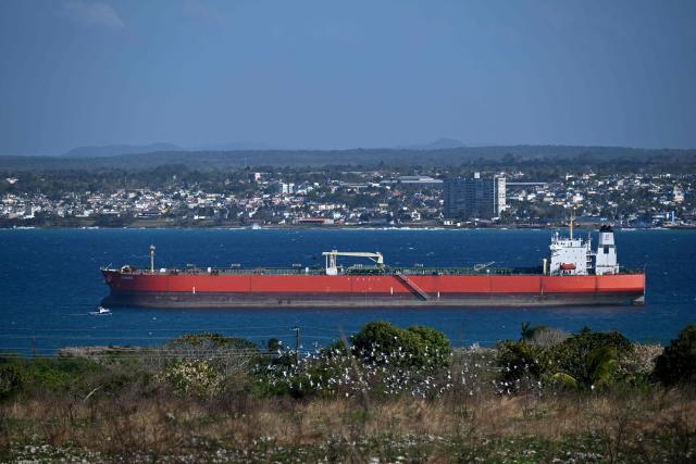 An oil tanker ship sails on Matanzas Bay, Cuba on March 30, 2026. US President Donald Trump said on March 29, 2026, that Moscow could send oil to Cuba despite Washington's de facto fuel blockade, as a Russian tanker was expected to deliver some much-needed crude to the crisis-hit island. The Anatoly Kolodkin, which is carrying 730,000 barrels of crude, was off northeast Cuba on the evening of March 29 and is expected to dock in the western port of Matanzas by March 31, according to shipping tracker MarineTraffic. (Photo by Yamil LAGE / AFP)