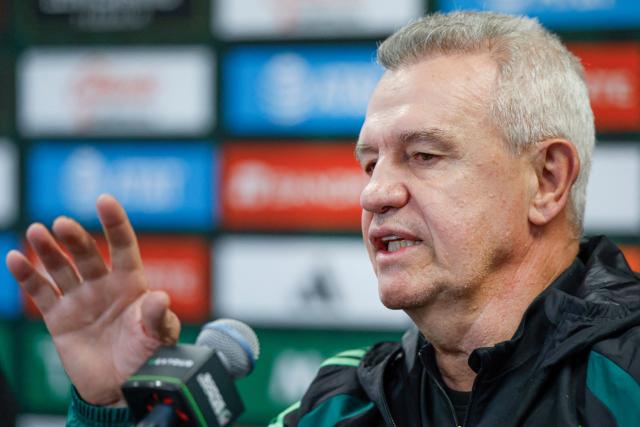 Mexico's head coach Javier Aguirre speaks during a press conference at Soldier Field in Chicago, on March 30, 2026. Mexico is preparing for tomorrow's international friendly match against Belgium, in advance of the 2026 World Cup. (Photo by KAMIL KRZACZYNSKI / AFP)