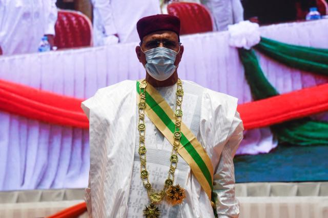(FILES) Niger's new President Mohamed Bazoum is photographed during his inauguration at the International Conference Center in Niamey on April 2, 2021. The term of Nigerien President Mohamed Bazoum, overthrown in a coup on July 26, 2023, by a military junta that has held him ever since, ends on Thursday, with no immediate prospect of his release or a trial.
Mr. Bazoum was sworn in as president on April 2, 2021, after winning the presidential election with 55% of the vote. Since the coup that brought General Abdourahamane Tiani's junta to power, he has consistently refused to resign and remains detained with his wife in a wing of the presidential palace in the capital, Niamey.
But for his lawyers, this April 2 date is meaningless, as Mr. Bazoum has been unable to perform his duties since July 2023. "April 2 will not be the end of his term," Moussa Coulibaly, a member of Mohamed Bazoum's legal team, told AFP. (Photo by BOUREIMA HAMA / AFP)