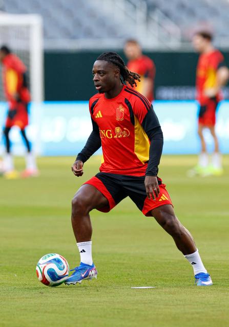 Belgium's forward Jeremy Doku warms up during a training session at Soldier Field in Chicago, Illinois on 30 March 2026. Belgium is preparing for tomorrow's international friendly match against Mexico, in advance of the 2026 World Cup. (Photo by KAMIL KRZACZYNSKI / AFP)