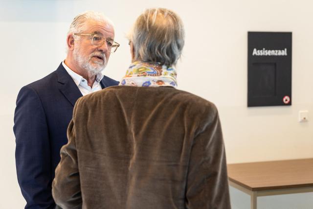 Former Optima Bank CEO Jeroen Piqueur (L) with lawyer Hans Rieder during the verdict in the Optima Bank case, in which he faces charges of money laundering, misappropriation of corporate assets and violations of banking legislation, at Ghent's criminal court in Ghent on March 31, 2026. (Photo by JAMES ARTHUR GEKIERE / Belga / AFP) / Belgium OUT
