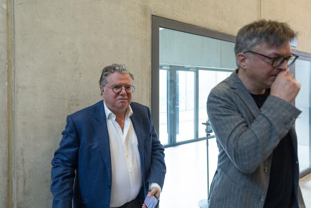Defenddant former Optima Bank management Frank Vincent  attends the verdict in the Optima Bank case, in which the former CEO faces charges of money laundering, misappropriation of corporate assets and violations of banking legislation, at Ghent's criminal court in Ghent on March 31, 2026. (Photo by JAMES ARTHUR GEKIERE / Belga / AFP) / Belgium OUT