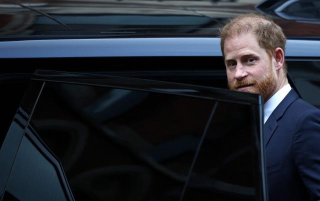 (FILES) Britain's Prince Harry, Duke of Sussex, enters a waiting car as he leaves the Royal Courts of Justice, Britain's High Court, in London on January 22, 2026, on the fourth day of the trial in his case against a major UK newspaper group. Prince Harry's legal team demanded a UK tabloid publisher pay him "substantial" damages for invading his privacy as a lengthy High Court civil trial was wrapping up on March 31, 2026. King Charles's estranged younger son Harry, pop star Elton John, and actor Elizabeth Hurley are among the seven public figures suing the Daily Mail and The Mail on Sunday publisher for allegedly unlawfully gathering intimate information to feed their papers. (Photo by Henry NICHOLLS / AFP)