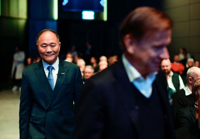 Volvo Cars CEO Hakan Samuelsson (R) and Chairman and Board Member of Volvo Cars Eric Li attend Volvo Cars' Annual General Meeting at World of Volvo in Gothenburg, on March 31, 2026. (Photo by Adam Ihse/TT / various sources / AFP) / Sweden OUT