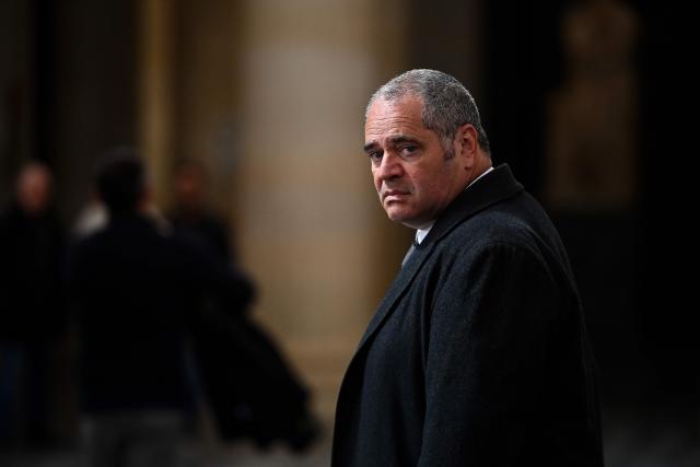 François Thierry, former chief of the French anti-narcotics office (Ocrtis), leaves the courtroom on the last day of his trial on charges of complicity in drug trafficking alongside 17 co-defendants, at the courthouse in Bordeaux, south-western France, on March 31, 2026. (Photo by Christophe ARCHAMBAULT / AFP)