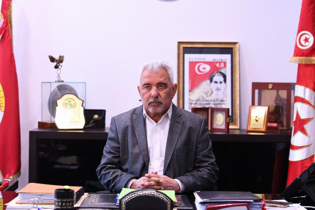 Slaheddine Selmi, the newly elected Secretary General of the Tunisian General Labour Union (UGTT), poses for a portrait in his office in Tunis on March 31, 2026 following the UGTT congress held in late March in Tunisia's coastal city of Monastir. The UGTT trade union federation, a major social and political player in Tunisia that is going through an internal crisis and experiencing tensions with the authorities, announced on March 28, that it had appointed its new leader following a congress. Slaheddine Selmi, former deputy secretary-general, becomes secretary-general of the union organization, succeeding Noureddine Tabboubi, who had headed the UGTT since 2017. (Photo by FETHI BELAID / AFP)