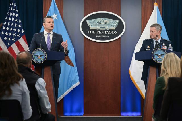 (L/R) US Secretary of Defense Pete Hegseth speaks alongside Chairman of the Joint Chiefs of Staff General Dan Caine during a press briefing at the Pentagon in Washington, DC, on March 31, 2026. Hegseth said Tuesday that talks on ending the Iran war are making progress even as the more than month-long US-Israeli military campaign against the Islamic republic continued. "They are very real. They are ongoing, they are active, and I think, gaining strength," Hegseth told reporters of the negotiations. (Photo by Oliver Contreras / AFP)