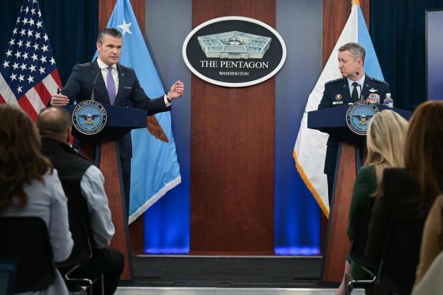 (L/R) US Secretary of Defense Pete Hegseth speaks alongside Chairman of the Joint Chiefs of Staff General Dan Caine during a press briefing at the Pentagon in Washington, DC, on March 31, 2026. Hegseth said Tuesday that talks on ending the Iran war are making progress even as the more than month-long US-Israeli military campaign against the Islamic republic continued. "They are very real. They are ongoing, they are active, and I think, gaining strength," Hegseth told reporters of the negotiations. (Photo by Oliver Contreras / AFP)