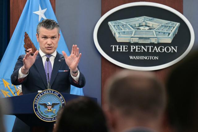 US Secretary of Defense Pete Hegseth speaks during a press briefing at the Pentagon in Washington, DC, on March 31, 2026. Hegseth said Tuesday that talks on ending the Iran war are making progress even as the more than month-long US-Israeli military campaign against the Islamic republic continued. "They are very real. They are ongoing, they are active, and I think, gaining strength," Hegseth told reporters of the negotiations. (Photo by Oliver Contreras / AFP)