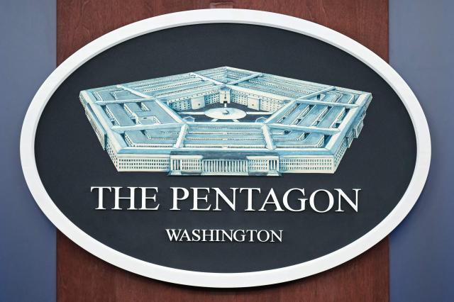 The Pentagon seal is seen in the briefing room at the Pentagon in Washington, DC, on March 31, 2026. US Secretary of Defense Pete Hegseth said Tuesday that talks on ending the Iran war are making progress even as the more than month-long US-Israeli military campaign against the Islamic republic continued. "They are very real. They are ongoing, they are active, and I think, gaining strength," Hegseth told reporters of the negotiations. (Photo by Oliver Contreras / AFP)
