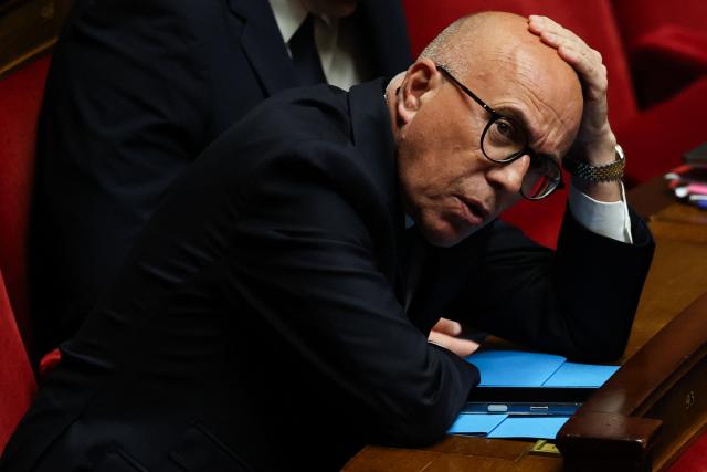 President of UDR parliamentary group Eric Ciotti reacts during a session of questions to the government at The National Assembly, France's lower house of parliament in Paris on March 31, 2026. (Photo by Anne-Christine POUJOULAT / AFP)