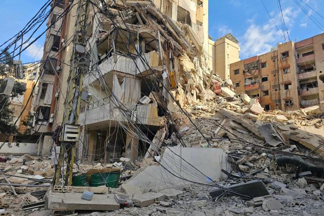 This picture taken on March 31, 2026 shows the destruction at the site of an Israeli airstrike that targeted the Bir al-Abed neighbourhood in the southern suburbs of the Lebanese capital Beirut. Israel's Defence Minister Israel Katz on March 31 said the military would occupy a swathe of southern Lebanon even after the end of the war against Hezbollah, as warplanes carried out fresh strikes on Beirut's southern suburbs. Lebanon was pulled into the Middle East conflict when Tehran-backed armed group Hezbollah fired rockets at Israel on March 2 in revenge for the killing of Iran's supreme leader, the opening salvo in the US-Israeli war against the Islamic republic. (Photo by AFP) / 