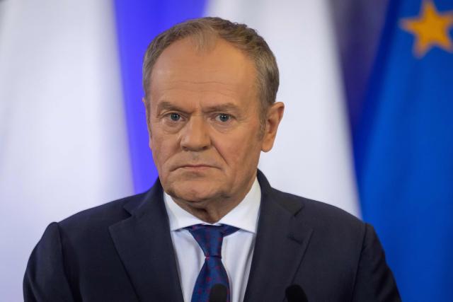 Poland's Prime Ministewr Donald Tusk looks on during a joint press conference with Irland's Prime Minister after their meeting in the government building in Warsaw, Poland, on March 31, 2026. (Photo by Wojtek RADWANSKI / AFP)
