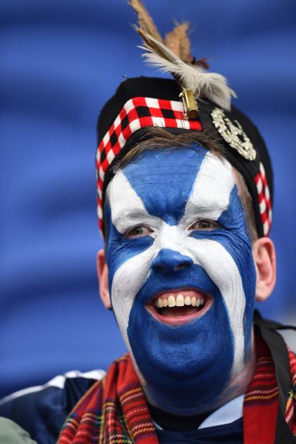 A member of the Tartan Army poses for a picture ahead of the friendly international football match between Scotland and Ivory Coast at the Hill Dickinson Stadium in Liverpool, north west England on March 31, 2026.  (Photo by PETER POWELL / AFP)