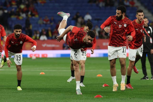 Egypt's defender #2 Yasser Ibrahim (C) warms up before the international friendly football match between Spain and Egypt at RCDE Stadium in Cornella de Llobregat, near Barcelona, on March 31, 2026. (Photo by Lluis GENE / AFP)