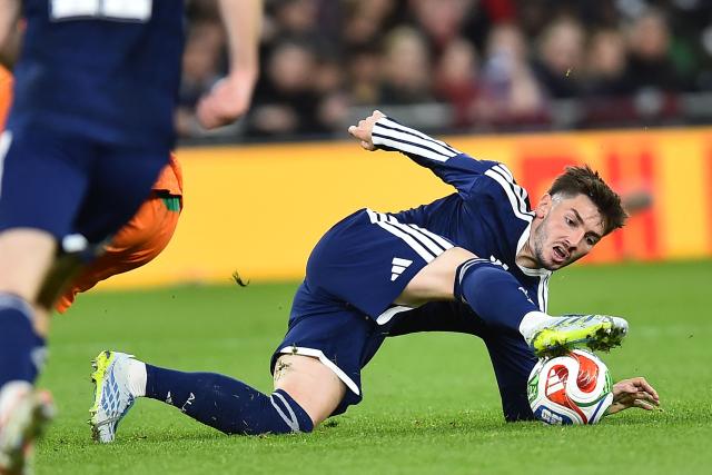 Scotland's midfielder #08 Billy Gilmour controls the ball during the friendly international football match between Scotland and Ivory Coast at the Hill Dickinson Stadium in Liverpool, north west England on March 31, 2026.  (Photo by PETER POWELL / AFP)
