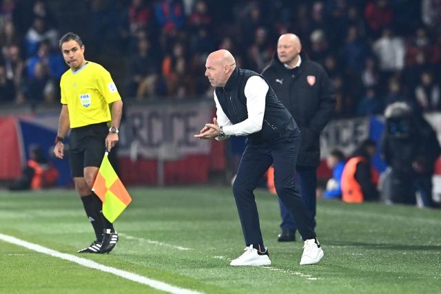 Denmark's head coach Brian Riemer (C) reacts on the sidelines during the FIFA World Cup 2026 European qualification final football match Czech Republic vs Denmark on March 31, 2026 in Prague, Czech Republic. (Photo by Michal Cizek / AFP)