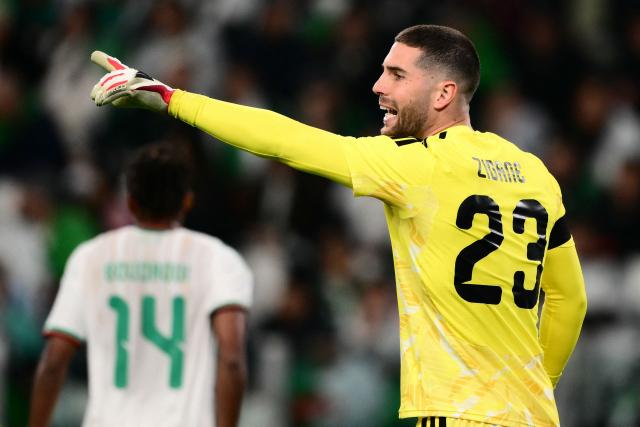 Algeria’s goalkeepers #23 Luca Zidane (R) gestures during the friendly international football match between Algeria and Uruguay at the Allianz Stadium in Turin on March 31, 2026. (Photo by MARCO BERTORELLO / AFP)