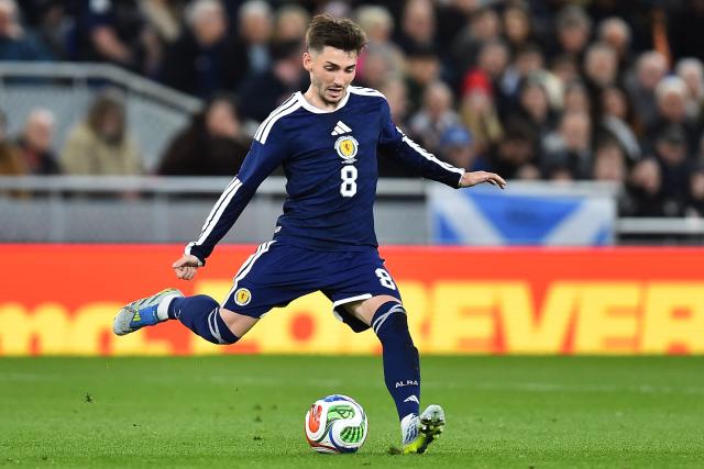Scotland's midfielder #08 Billy Gilmour passes the ball during the friendly international football match between Scotland and Ivory Coast at the Hill Dickinson Stadium in Liverpool, north west England on March 31, 2026.  (Photo by PETER POWELL / AFP)