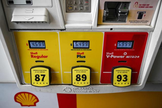 Gasoline prices are seen at a Shell gas station in Houston, Texas, on March 31, 2026. (Photo by RONALDO SCHEMIDT / AFP)