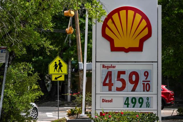 Gasoline prices are seen at a Shell gas station in Houston, Texas, on March 31, 2026. (Photo by RONALDO SCHEMIDT / AFP)