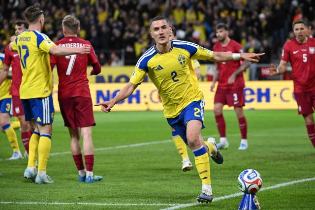 Sweden's defender #02 Gustaf Lagerbielke celebrates scoring his team's second goal 2:1 during the FIFA World Cup 2026 European qualification final football match between Sweden and Poland in Solna, Sweden, on March 31, 2026. (Photo by Jonathan Nackstrand / AFP)